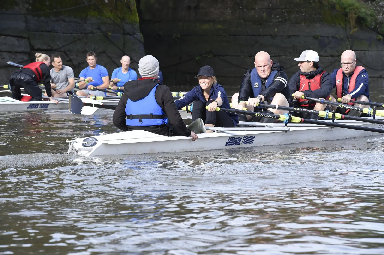 A group of people rowing